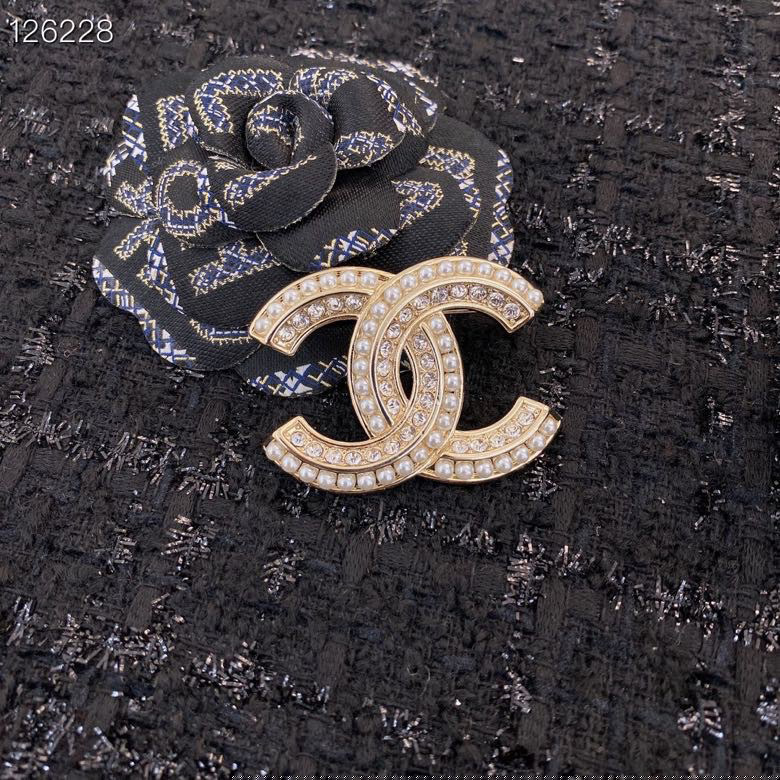 Ch*el brooches
